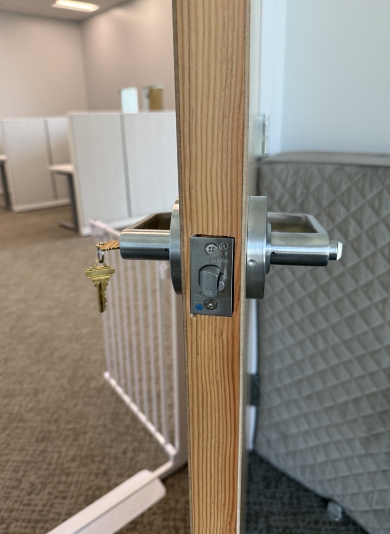 Commercial door handle and lock installation in a Tampa office